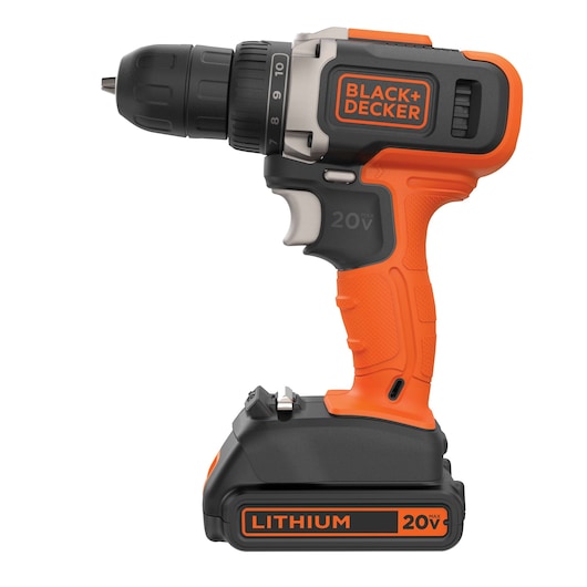 Photo of BLACK+DECKER BCD703C1 cordless drill, orange and black, 20V lithium battery, side view on white background.