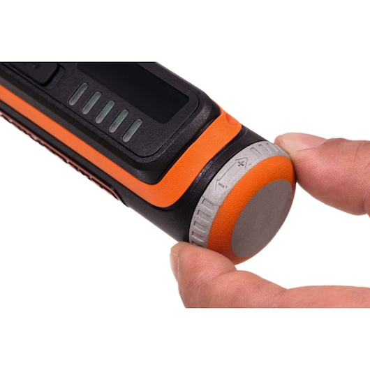 BLACKDECKER BCRT8K35 photography of handheld tool with gray and orange dial being adjusted, close-up side angle.