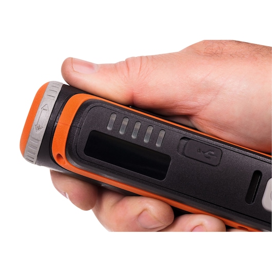 BLACKDECKER BCRT8K35 compact orange and black handheld tool with USB port, close-up view.