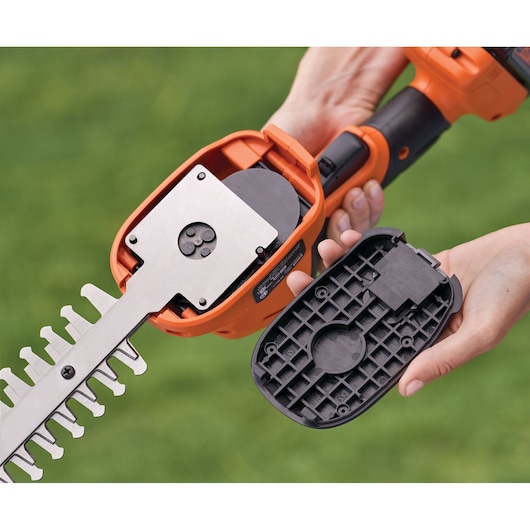 BLACKDECKER BCSS820D1 cordless shrub shear with cover removed, showing blade assembly close-up.