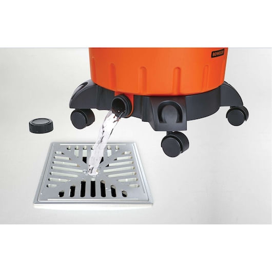 BLACKDECKER BDWD20 wet and dry vacuum draining water into floor drain, side angle on white background.