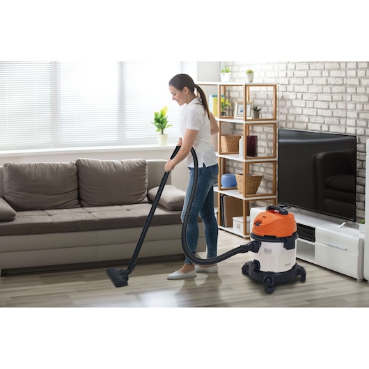 Photo of BLACKDECKER BDWDS20 wet and dry vacuum cleaner used on living room floor.