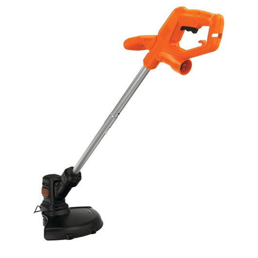 Photo of BLACKDECKER BEST935 grass trimmer with orange handle, silver shaft, and black cutting head, side angle.