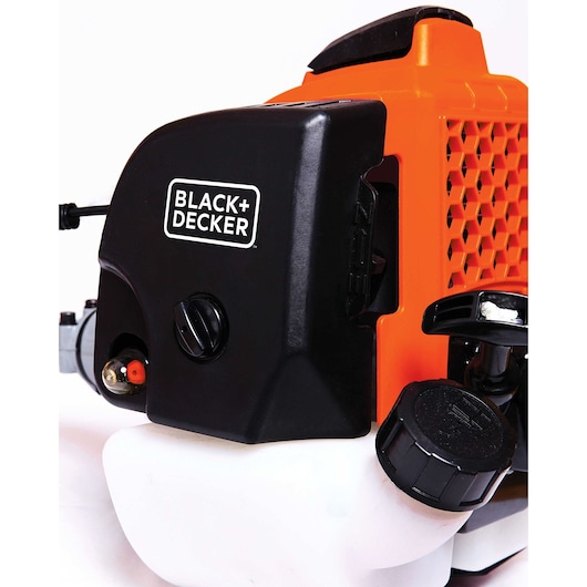 Close-up side view of BLACK+DECKER GST33 orange and black power tool engine on white background.